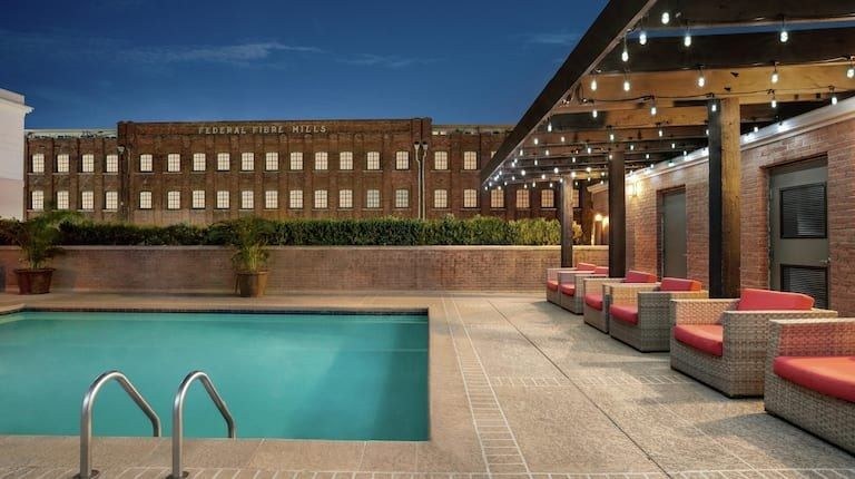 Rooftop pool at dusk at Hilton Garden Inn New Orleans Convention Center